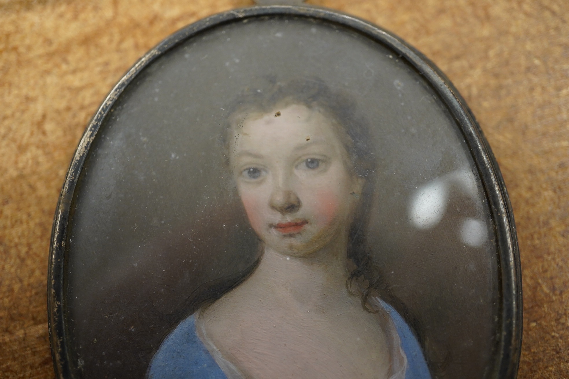 Manner of Christian Richter (Swedish 1678-1732), late 18th century oil on copper, Portrait miniature of a young woman, Ernest Salaman collection inscribed label verso, 6 x 5cm. Condition - fair